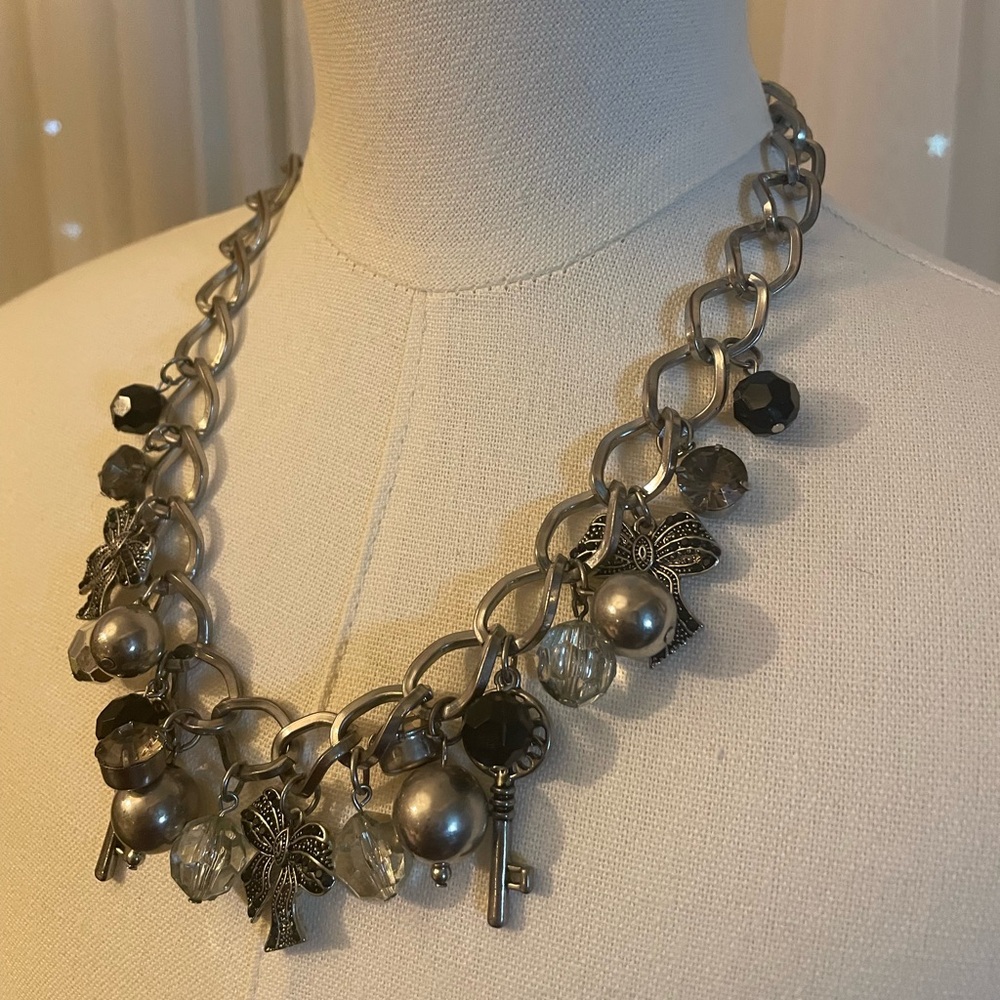 Silvertone necklace with charms